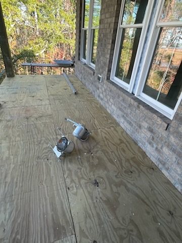 Deck substrate preparation before EPDM waterproofing on a Carolina Beach project