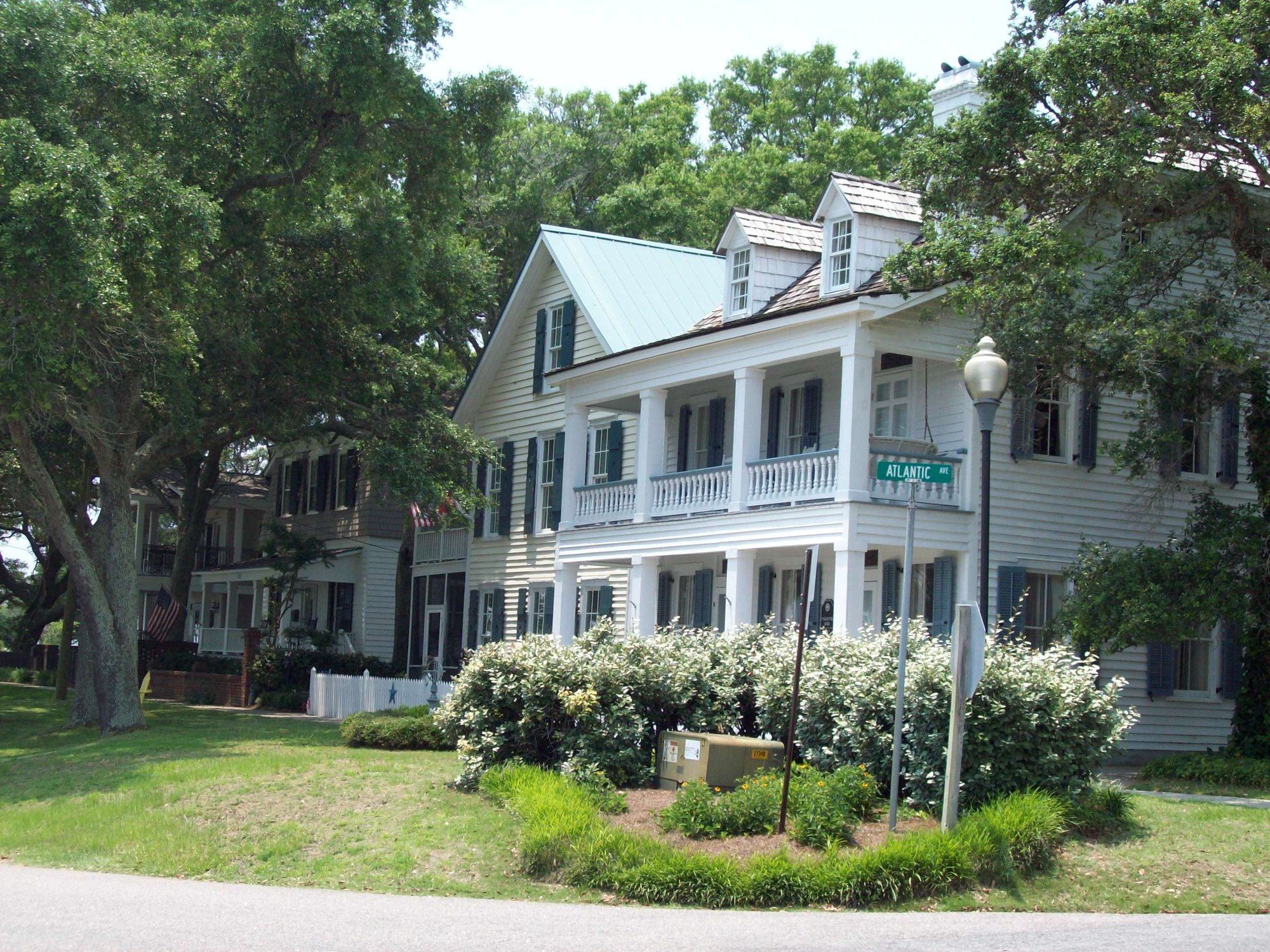 Location photo: oak-lined street in the Southport Historic District, NC (public photo, not a Veras Roofing job photo)