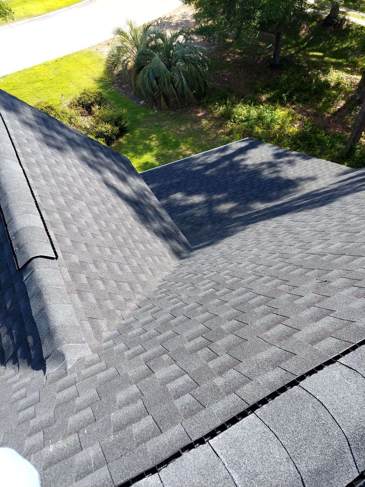 Clean finished shingle roof detail on a residential home