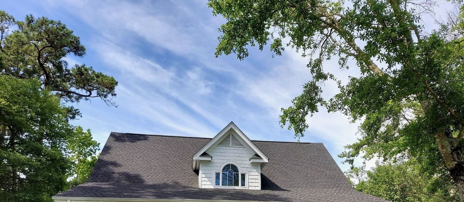 Finished shingle roofline on a residential home