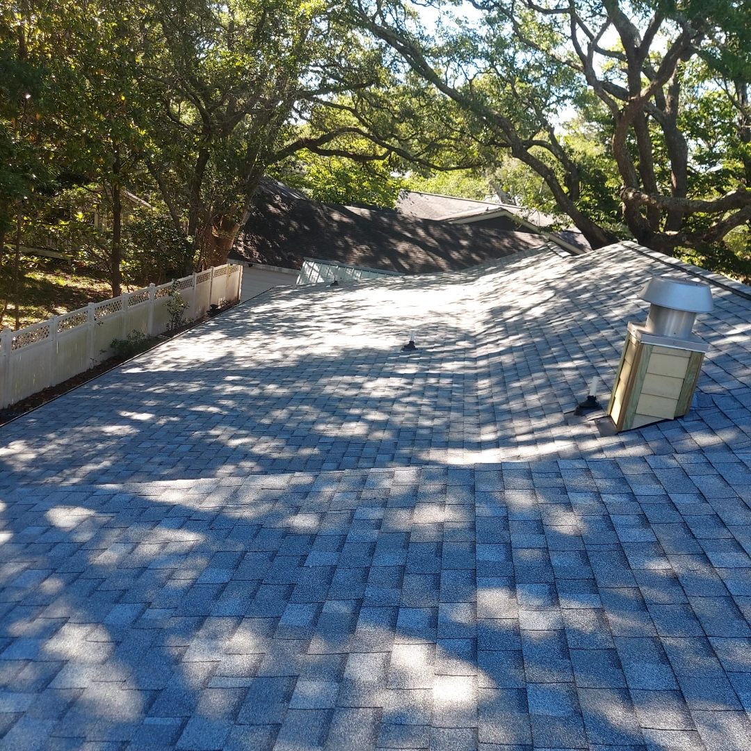 Finished shingle roof slope and roofline after roof work