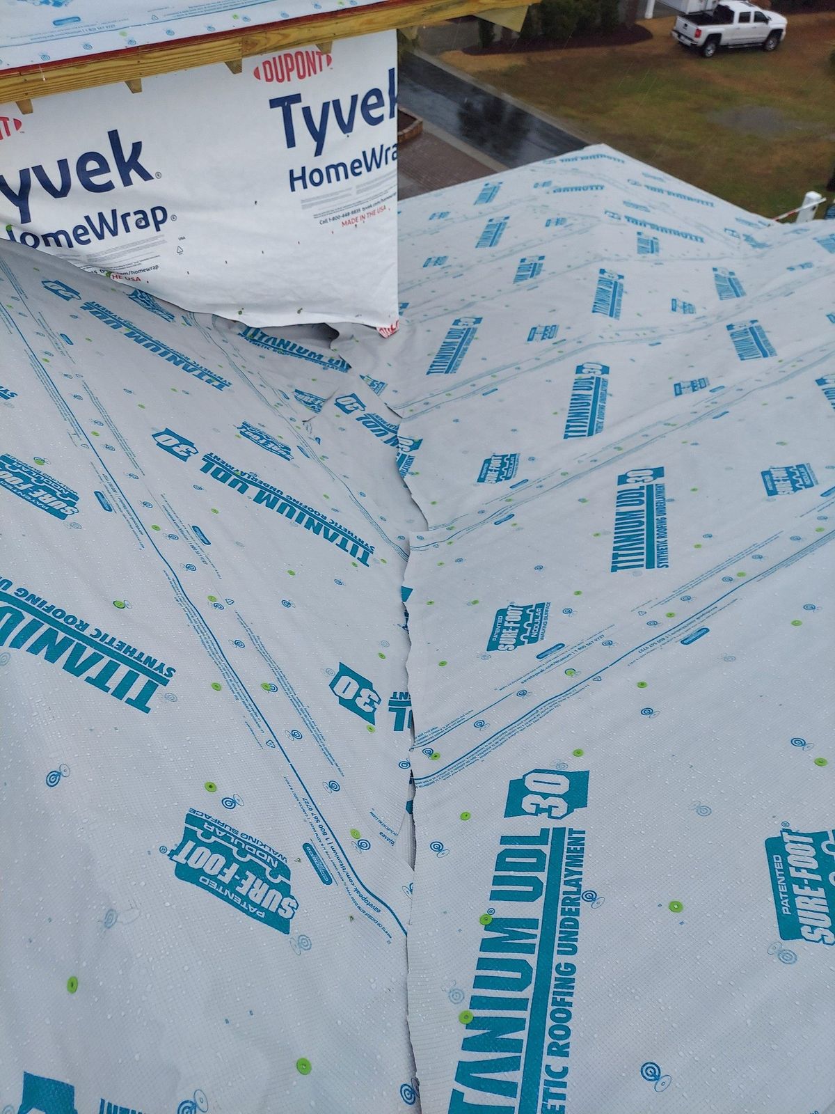 Synthetic roof underlayment installed during roof preparation