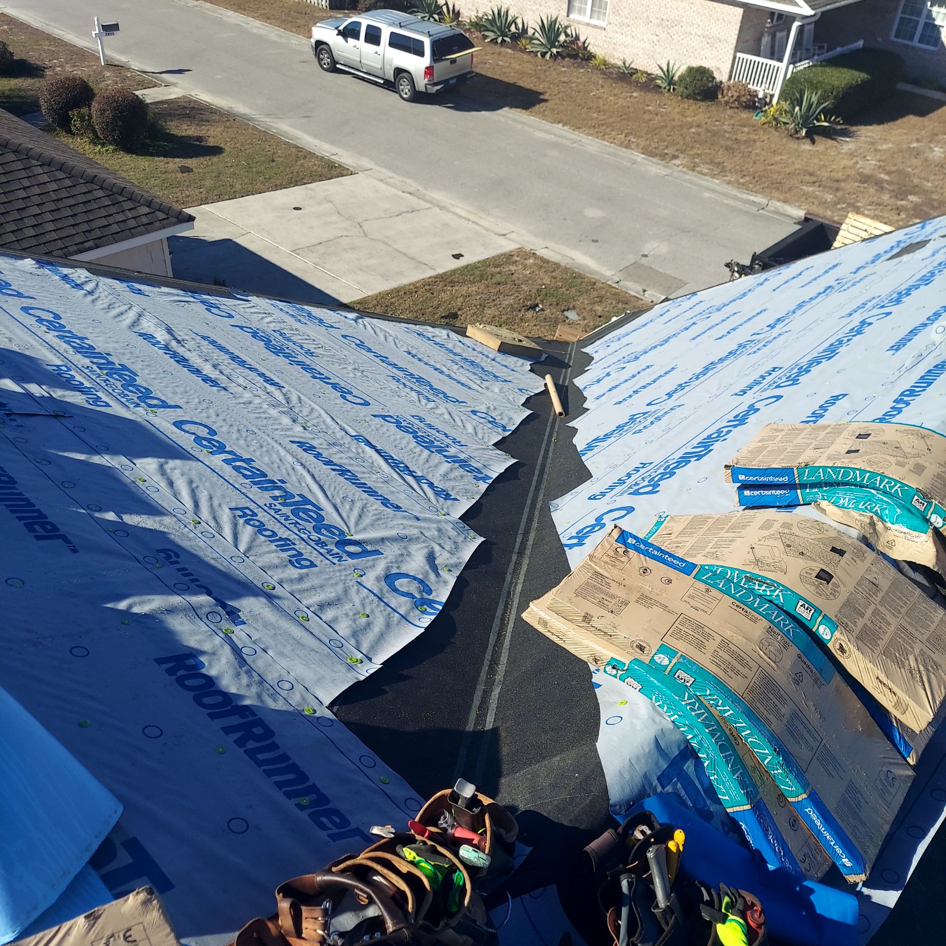 Roof underlayment installed around a valley during roof preparation